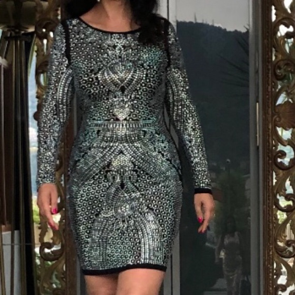 It’s a black dress covered in diamond studs